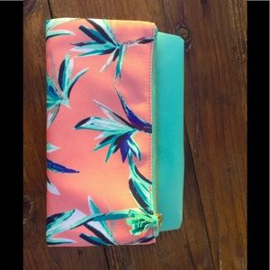 Reversible clutch handbag